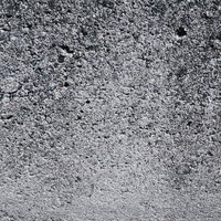 細かい凹凸のあるコンクリート壁のテクスチャーの写真