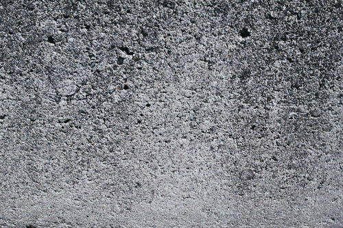 細かい凹凸のあるコンクリート壁のテクスチャー